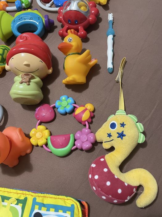 Іграшки для новонароджених. Гризунці. Брязкальця. Кліпса для соски.