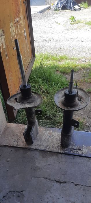 Амортизатор стійка Пежо 3008 5008