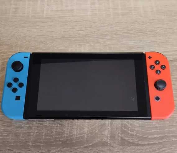 Nintendo Switch  com comandos e dock