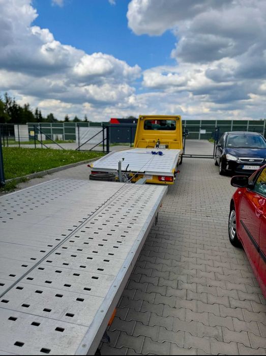 Transport samochodów LAWETA –  WARSZAWA / Kraj i za granicą