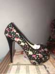 Sapatos de salto alto