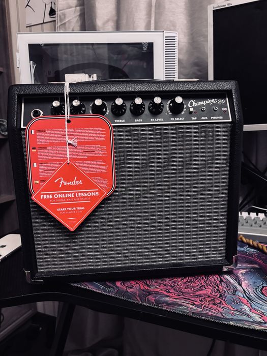 новый усилок fender champion 20