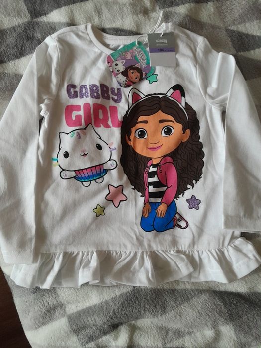 Nowa biala bluzeczką z falbanką