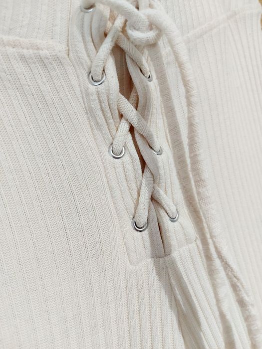 Kremowe prążkowane getry dzwony spodnie z wysokim stanem roz 34 Zara