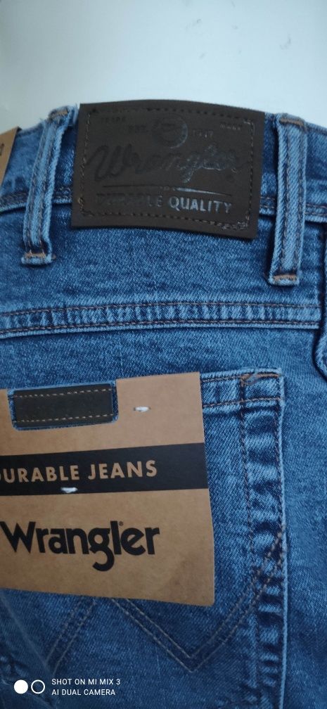 Wrangler Regular Stonewash wyprzedaż męskie jeansy 35/32 jak 34/32