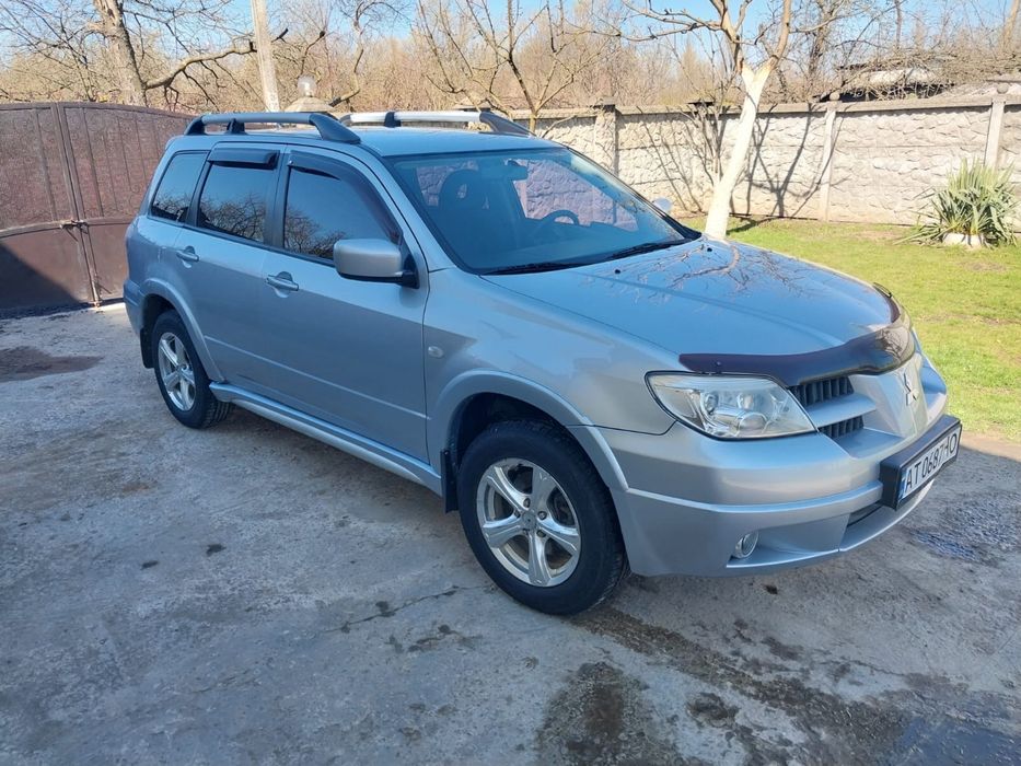 Mitsubishi outlander 1 покоління 2008 рік