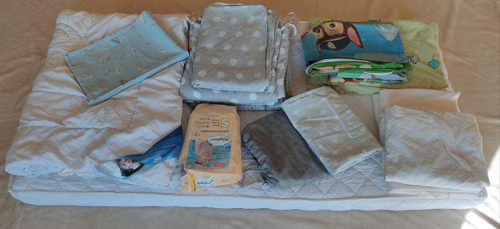 Wyprawka: materac + kołdra + pościele, prześcieradła, podkłady