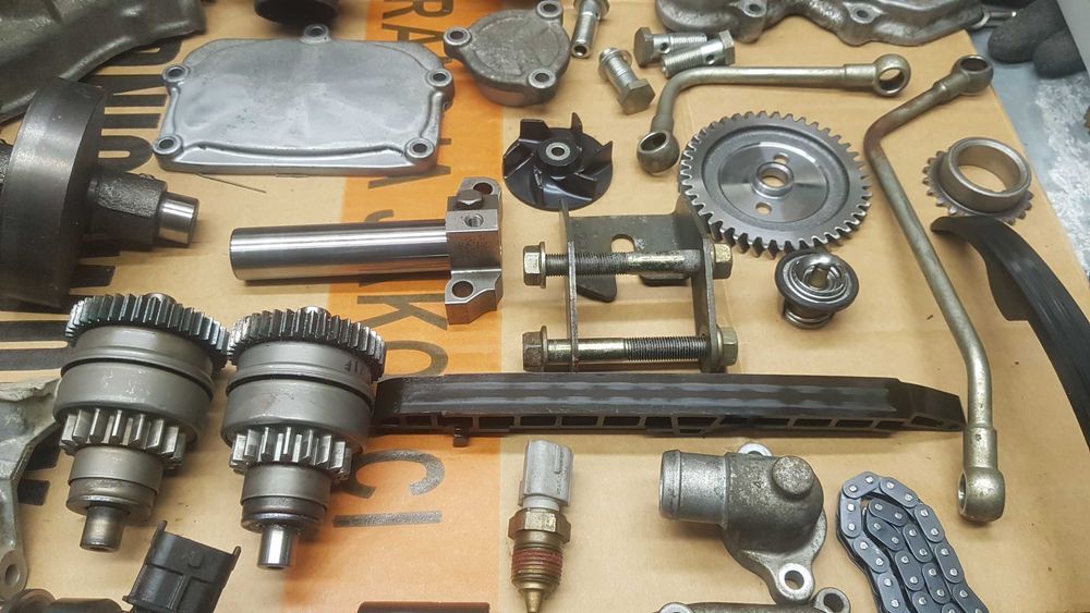 polaris 500 sportsman kartery glowica wal stator magneto slizg pompa