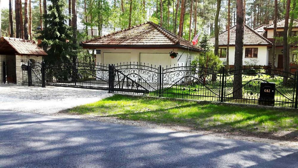 Ogrodzenia kute brama skrzydłowa bramy wjazdowe metalowe kowalstwo