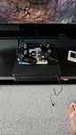 PS4 com jogos e 2 controlos.