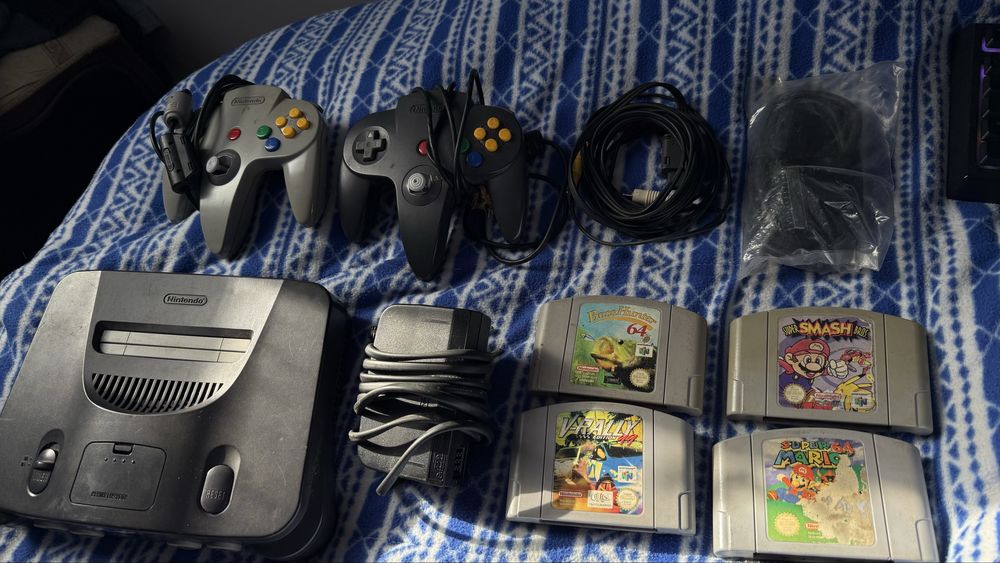Nintendo 64 + 2 comandos + 4 jogos