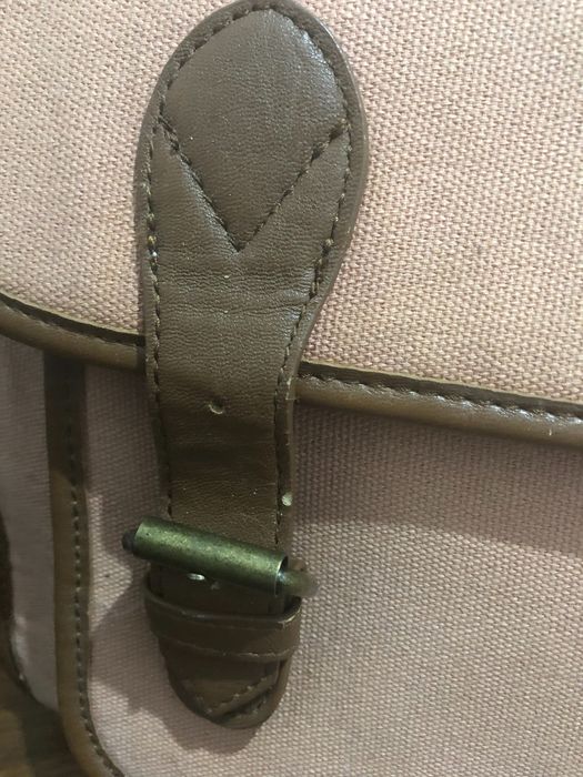 Mala mulher à tira cola