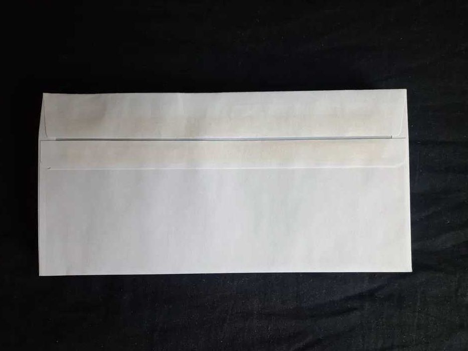 Koperty DL białe 35 sztuk ze znaczkami 4,10 zł bez okienka