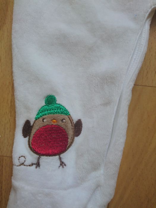 Новорічний чоловічок George на 6-9 місяців.