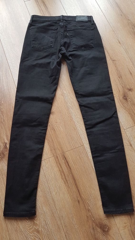 Levi's 710 super skinny jeansy spodnie damskie dżinsy czarne W27 L30