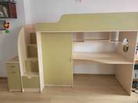 Łóżko piętrowe z biurkiem,szafą i schodami.