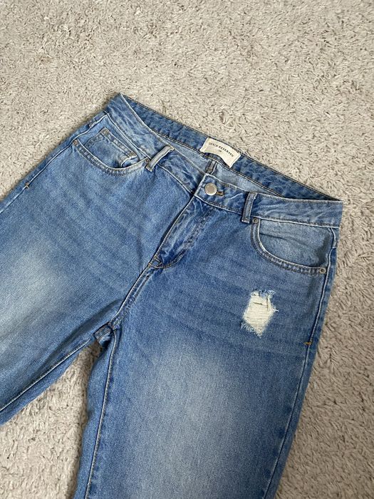 Niebieskie dżinsy jeansy boyfriend z dziurami Reserved rozmiar 38 M