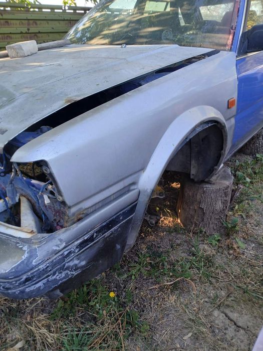 Крило Nissan Bluebird u11,t12,t72