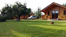 rezerwacje 2025 Domki noclegi Wilkasy Giżycko Mazury sauna jacuzzi