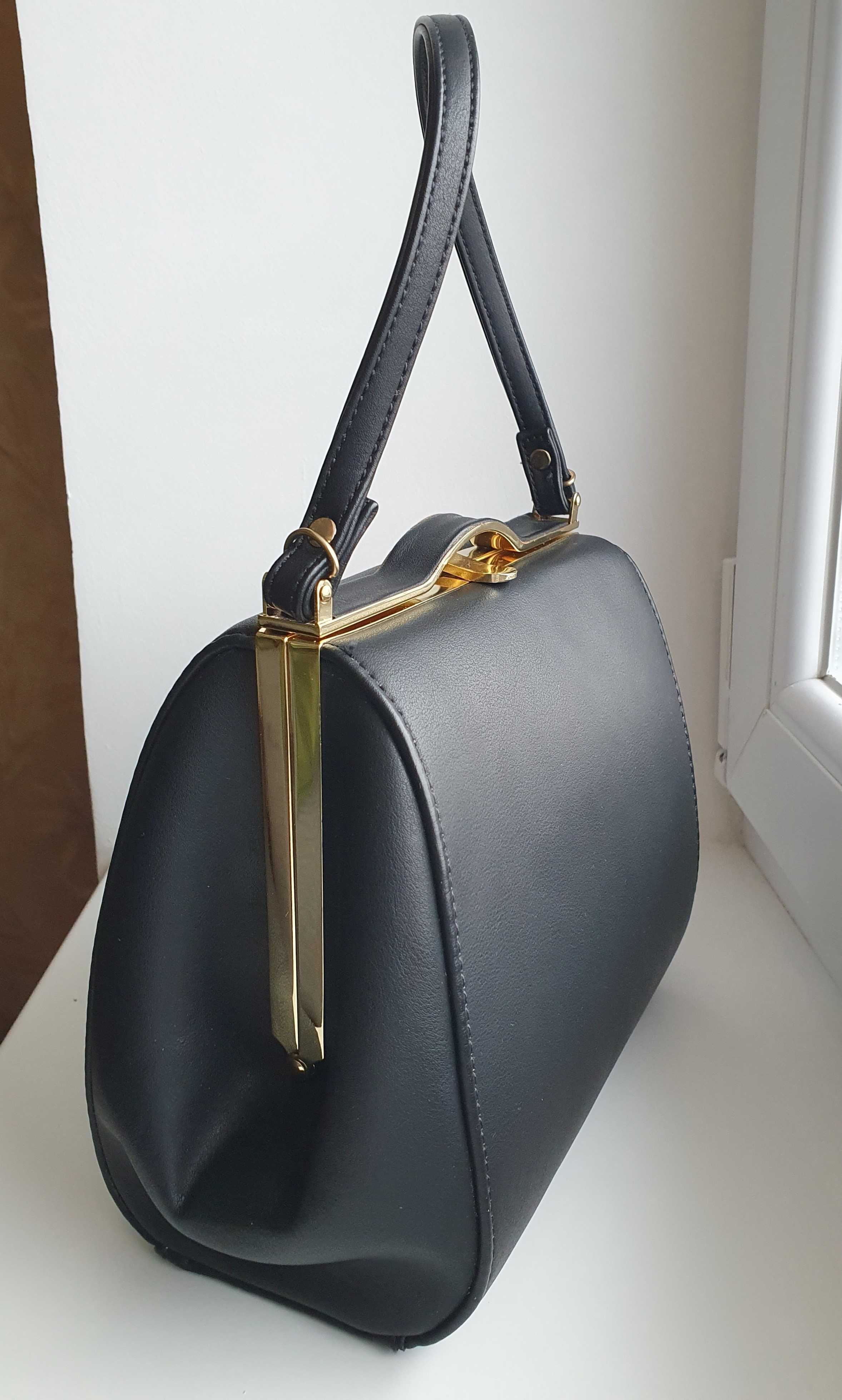 Нова чорна сумка martina k, середнього розміру