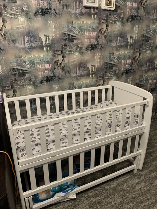 детская кроватка с маятником