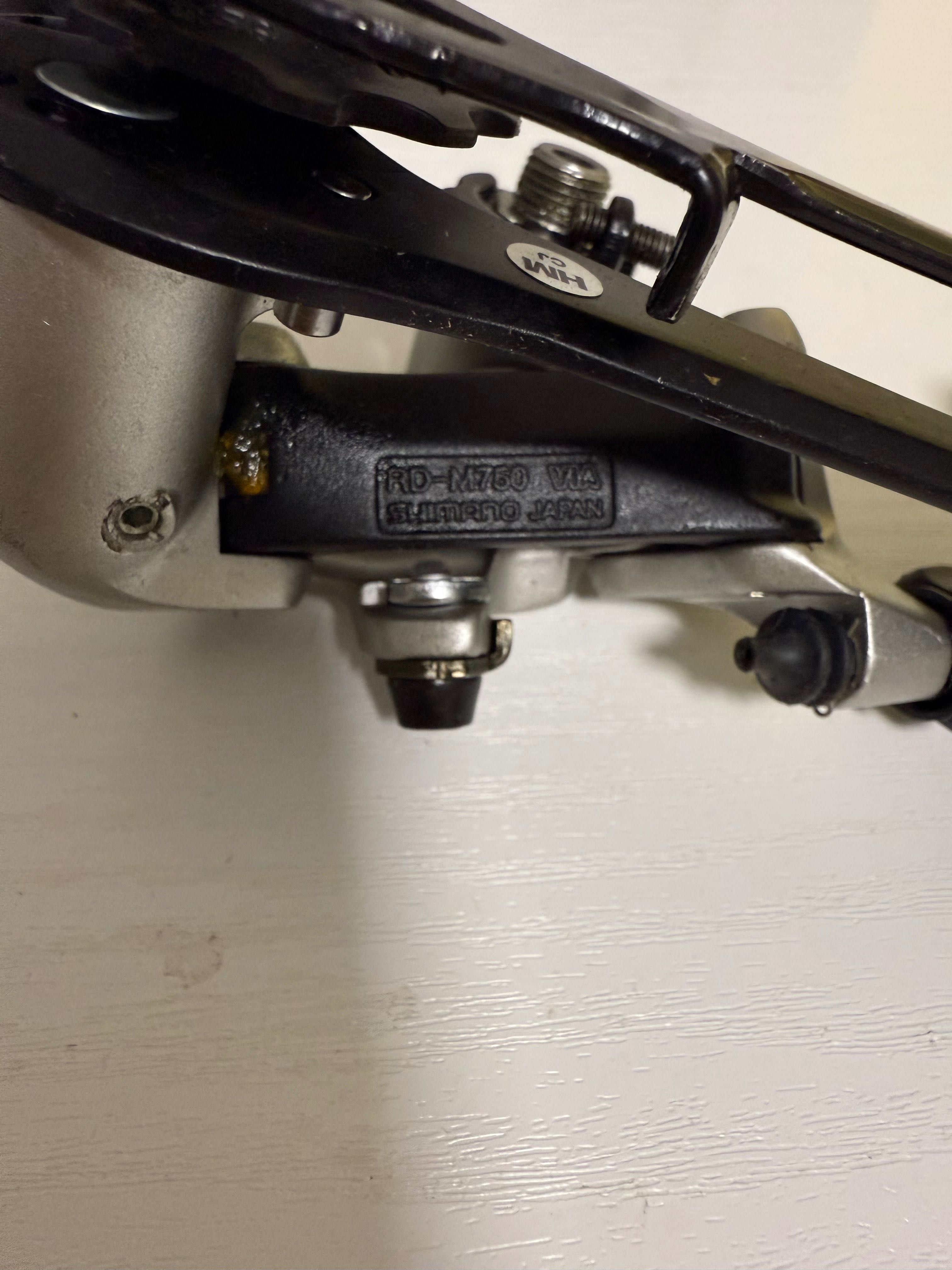 Задній перемикач Shimano Deore XT M750 9 швидкостей
