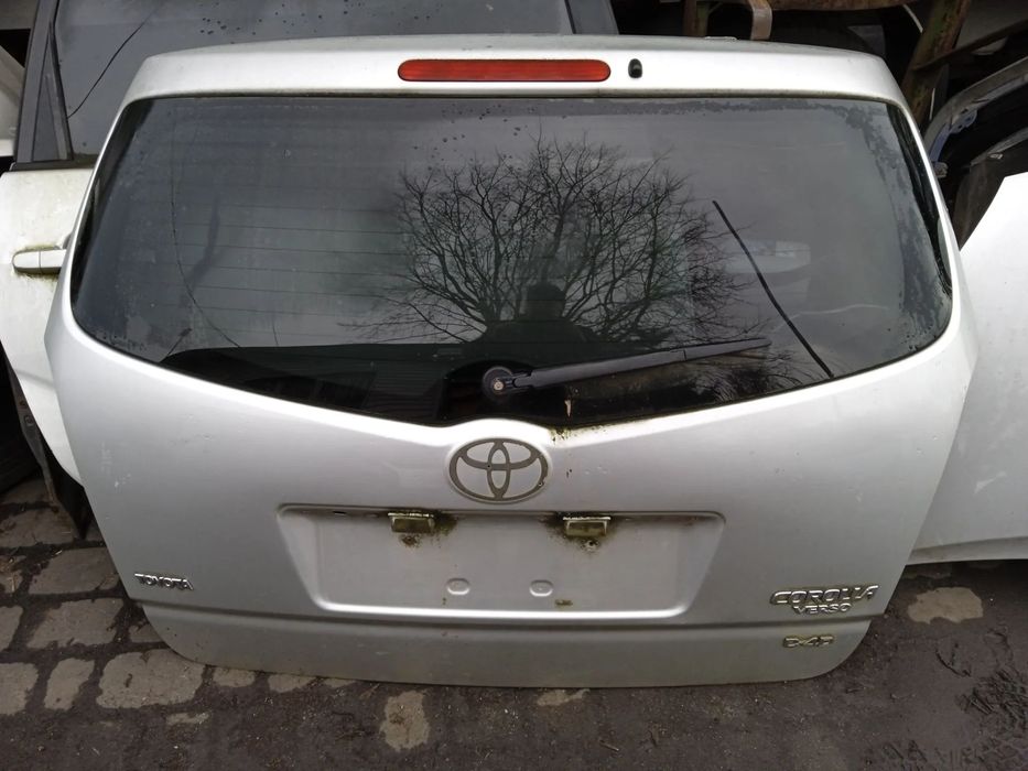 KLAPA TYLNA TOYOTA COROLLA VERSO 04-09 ZAMEK STOP MECHANIZM WYCIERACZKI BEZ SZYBY