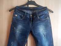 spodnie dżinsy jeansy przetarcia dziury XS S