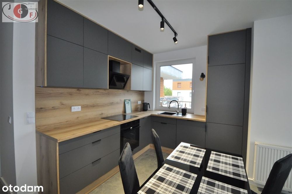 Nowy apartament z komórką i garażem podziemnym