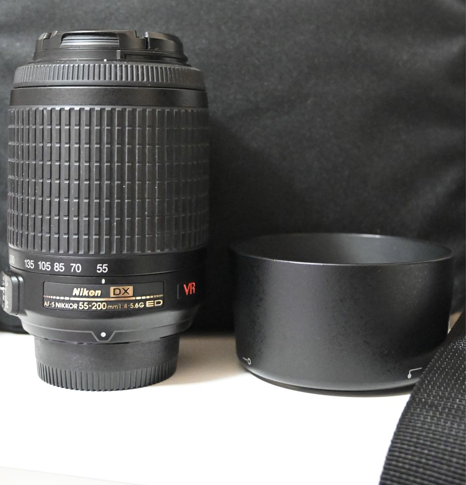 Nikon D3400, lentes 18-55, 35mm e 55-200,  tripé e bolsa