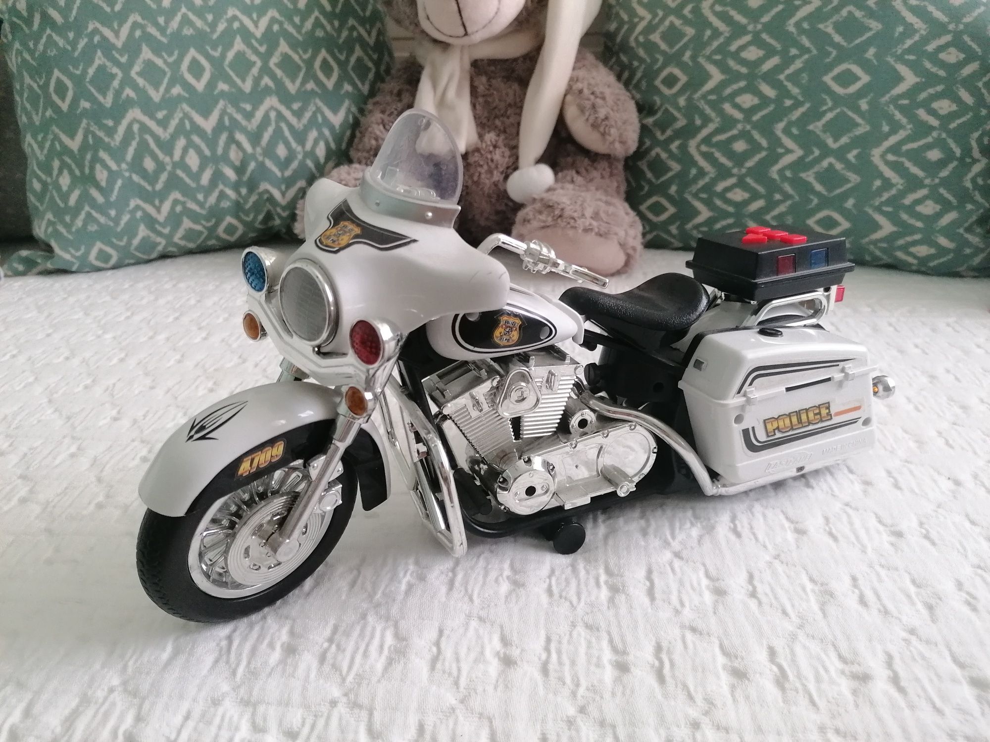 Brinquedo mota de polícia com som e luzes