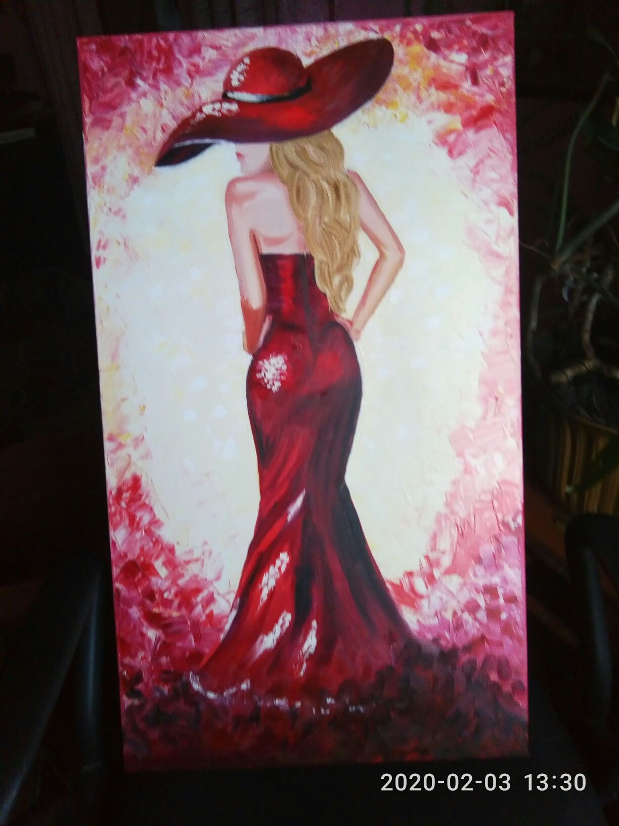 Картини "Море", "Жінка в червоному", а також ручна вишивка,.