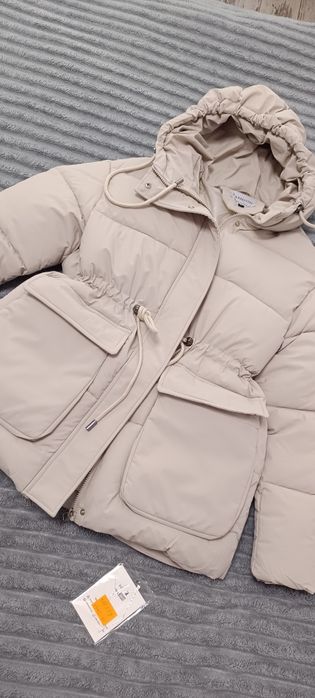Зимова куртка на затяжках