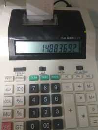 Бухгалтерский калькулятор с печатающей головкой.