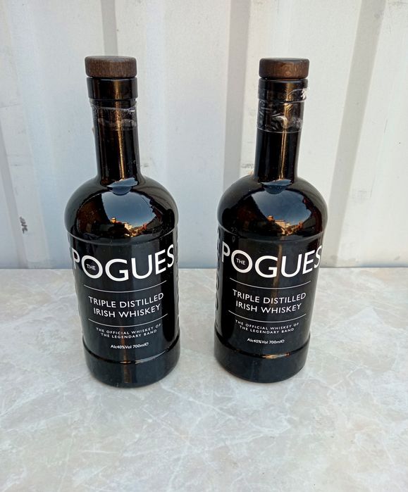 Порожні пляшки з-під Pogues 0.7 л