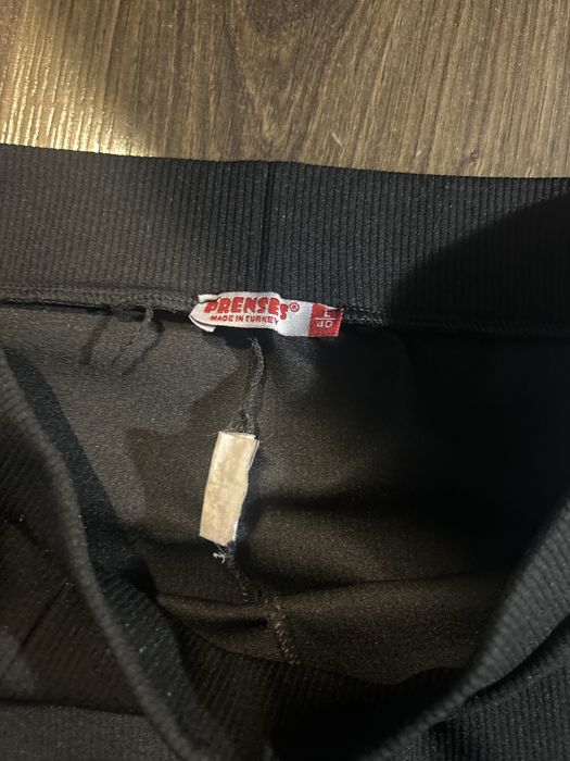 штани/брюки/лосіни кльош з розрізом