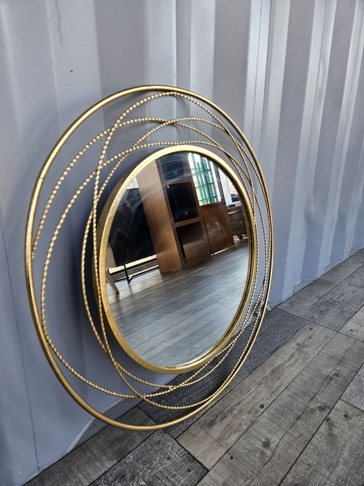 Złote lustro okrągła rama