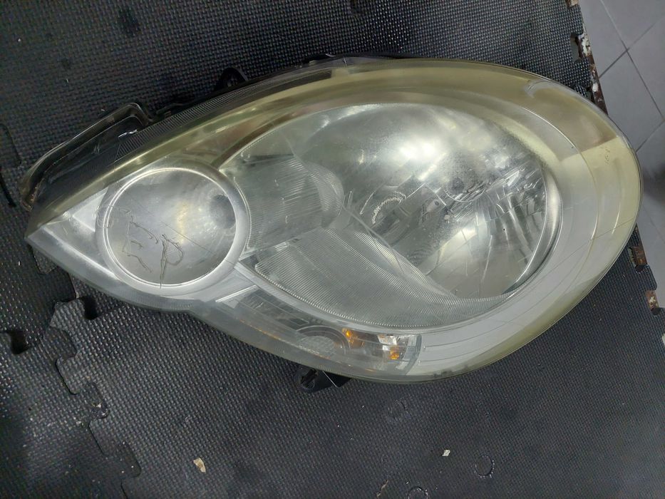 farol esq Renault kangoo
