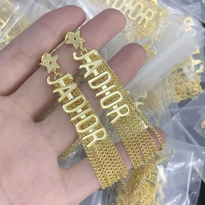 Nowe kolczyki Christian Dior CD stal nierdzewna