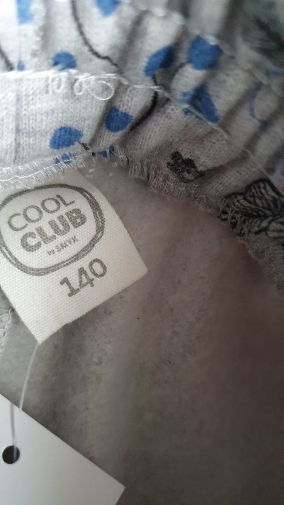 Nowe ocieplane spodnie dresowe Cool Club 140 kwiaty