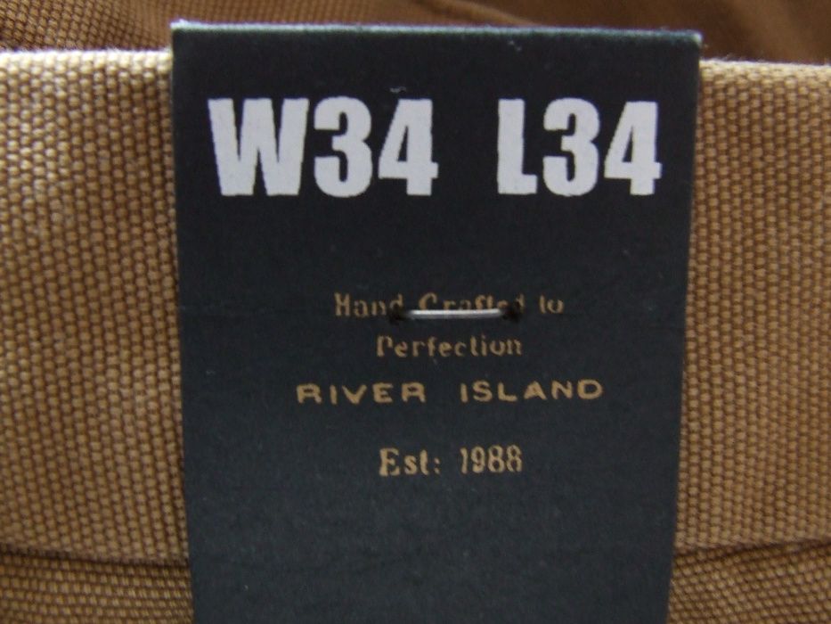 Spodnie River Island skręty 34/34 34L
