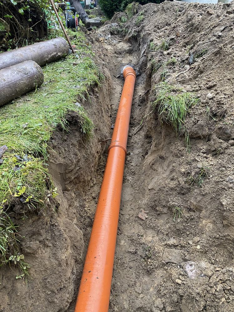 Szamba betonowe ekologiczne drenaże tunelowe montaż i dostawa koparka