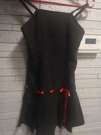 Czarna sukienka dla dziewczynki, rozmiar wypada 116/122