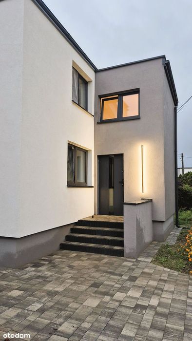 Dom wolnostojący w Toruniu na Stawkach z tarasem i dużą działką 698 m²