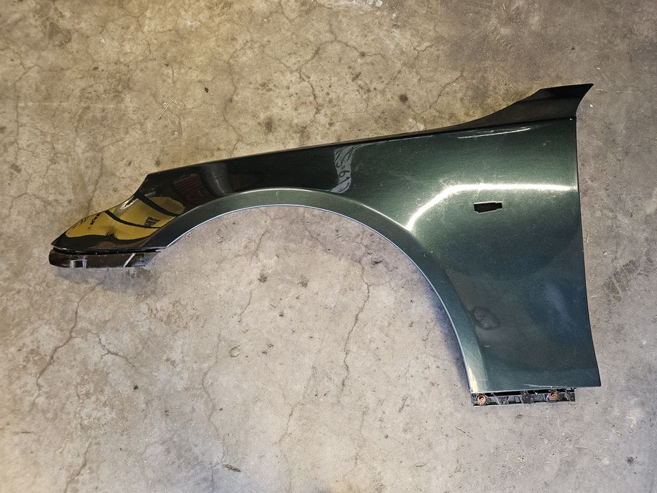 Blotnik lewy bmw e60 e61 fahrgruen metallic