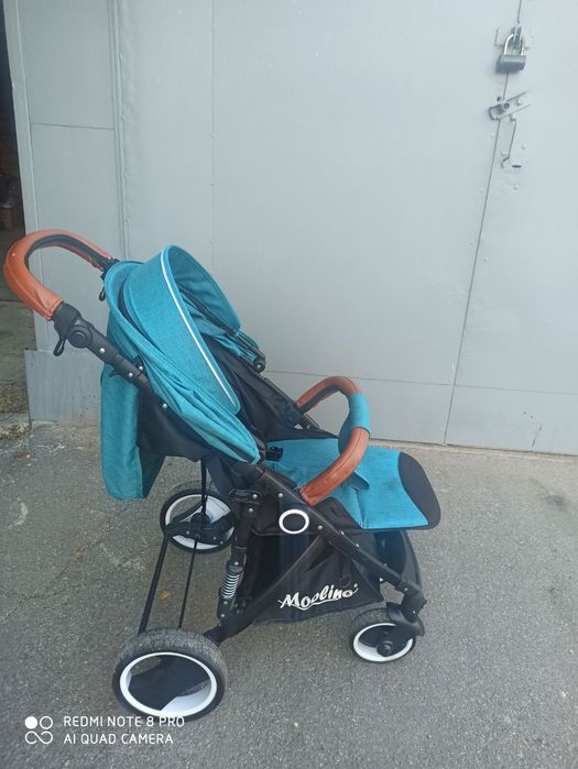 Прогулянкова коляска.