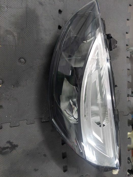 farol esq Renault Clio iv