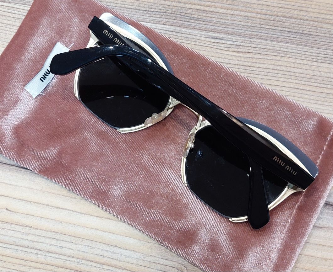 Зеркальні жіночі сонцезахисні окуляри  Cat eye SMU53T від Miu Miu!
