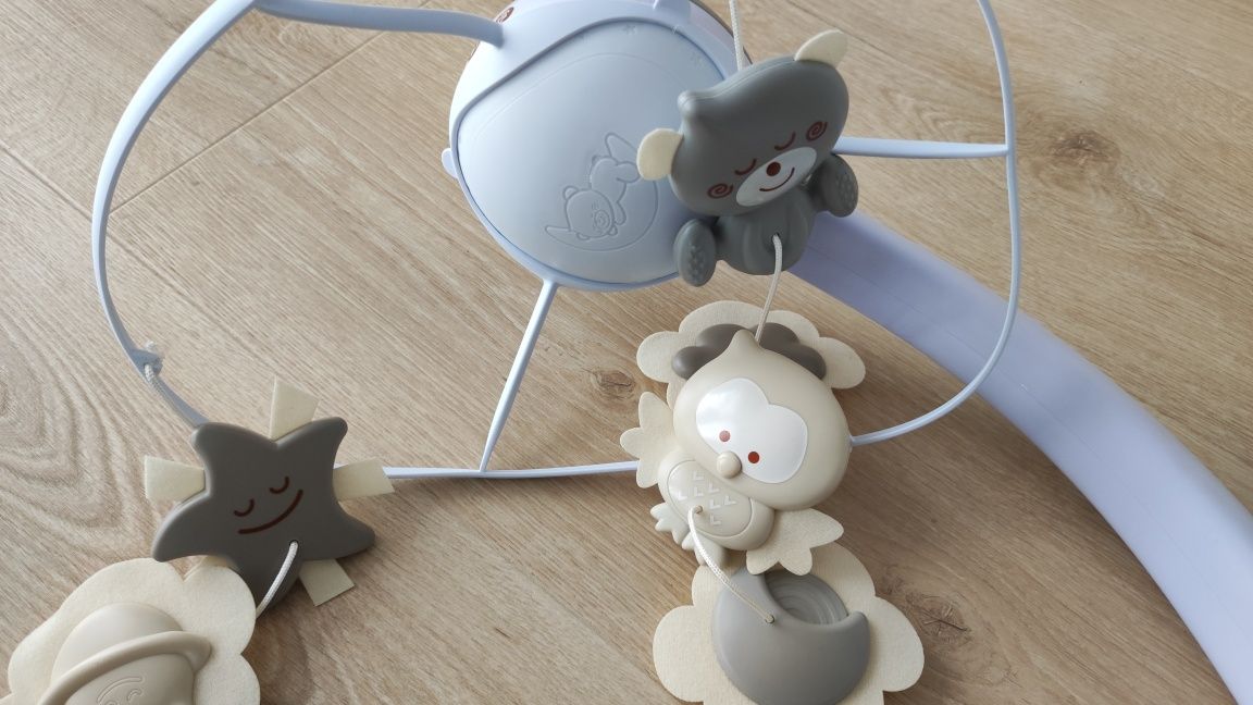 Karuzela niemowlęca do łóżeczka na łóżeczko projektor kolory dźwięki