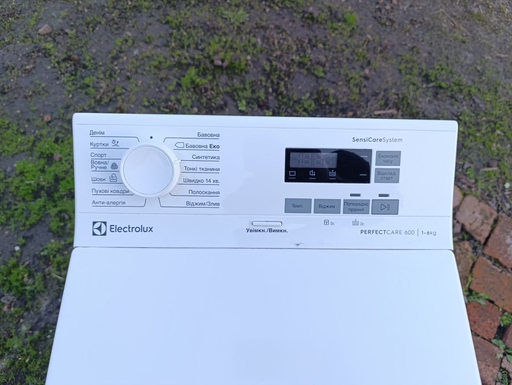 Стиральная машинка автомат вертикальная загрузка Electrolux EW6T5061U